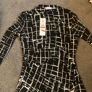 NWT! brand new Calvin Klein top - mesh sleeves - black and white - size XS